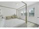 Main bedroom with canopy bed, dresser, and crib at 10951 Citron Oaks Dr, Orlando, FL 32836