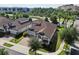 House with brown tile roof and two-car garage at 10951 Citron Oaks Dr, Orlando, FL 32836