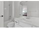 Clean bathroom with white vanity, bathtub, and shower at 10951 Citron Oaks Dr, Orlando, FL 32836