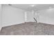 Bright bonus room with carpet and access to upper floor at 10951 Citron Oaks Dr, Orlando, FL 32836