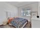 Bedroom with full-size bed and floral bedding at 10951 Citron Oaks Dr, Orlando, FL 32836