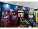 Image shows an arcade featuring various game machines at 7443 Marker Ave, Kissimmee, FL 34747
