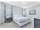 Spacious bedroom with king-size bed and modern decor at 7443 Marker Ave, Kissimmee, FL 34747