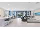 Open concept living and kitchen area with modern finishes at 7443 Marker Ave, Kissimmee, FL 34747