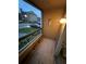 Small balcony overlooking the community at 5587 Devonbriar Way # 105, Orlando, FL 32822