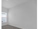 Bright bedroom with window and neutral wall paint at 4945 Worchester Dr, Kissimmee, FL 34746