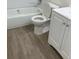 Bathroom with white vanity, toilet and tub at 914 Lake Destiny Rd # H, Altamonte Springs, FL 32714