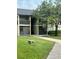 Condo building exterior with landscaping at 914 Lake Destiny Rd # H, Altamonte Springs, FL 32714