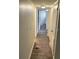 Clean hallway with light walls and wood-look floors at 914 Lake Destiny Rd # H, Altamonte Springs, FL 32714
