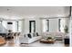 Open living room with neutral color palette and hardwood floors at 33 S Graham Ave, Orlando, FL 32803