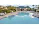 Resort-style pool with a covered cabana and plenty of lounge chairs at 2723 Plume Rd, Clermont, FL 34711