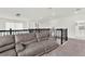 Relaxing loft with sectional sofa, overlooking the main level at 2723 Plume Rd, Clermont, FL 34711