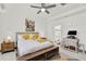 Main bedroom with a king-size bed and ensuite bathroom at 2723 Plume Rd, Clermont, FL 34711