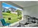 Outdoor patio with grill, seating, and fire pit at 2723 Plume Rd, Clermont, FL 34711