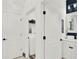 Bright laundry room with washer and dryer, and ample shelving at 2723 Plume Rd, Clermont, FL 34711