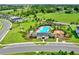 Community pool, playground, and clubhouse at 2723 Plume Rd, Clermont, FL 34711