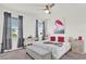 Comfortable bedroom with king-size bed and stylish decor at 2723 Plume Rd, Clermont, FL 34711