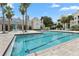 Community swimming pool with plenty of lounge chairs at 1069 S Hiawassee Rd # 1336, Orlando, FL 32835