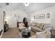 Living room with two sofas, coffee table, and entryway at 1069 S Hiawassee Rd # 1336, Orlando, FL 32835
