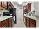 Well-equipped kitchen featuring ample cabinetry and modern appliances at 1069 S Hiawassee Rd # 1336, Orlando, FL 32835