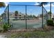 Well-maintained tennis court with chain-link fence at 1069 S Hiawassee Rd # 1336, Orlando, FL 32835