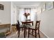 Cozy dining area with a charming triangular table and seating for four at 1069 S Hiawassee Rd # 1336, Orlando, FL 32835