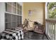 Private balcony with seating, a bicycle, and a view of trees at 1069 S Hiawassee Rd # 1336, Orlando, FL 32835