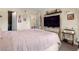 Comfortable bedroom with a queen-sized bed and a flat-screen TV at 1069 S Hiawassee Rd # 1336, Orlando, FL 32835