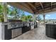 Stainless steel grills and prep station in a covered pavilion at 1069 S Hiawassee Rd # 1336, Orlando, FL 32835