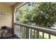 Screened balcony offering a serene view of lush greenery at 1069 S Hiawassee Rd # 1336, Orlando, FL 32835