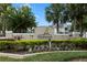 Landscaped entrance sign for Tradewinds Metrowest Condominium at 1069 S Hiawassee Rd # 1336, Orlando, FL 32835