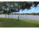 Scenic view of lake and community from grassy area at 1069 S Hiawassee Rd # 1336, Orlando, FL 32835