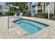 Relaxing community hot tub with surrounding patio at 1069 S Hiawassee Rd # 1336, Orlando, FL 32835