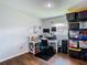 Home office with a desk, chair, and storage shelving at 240 People St, Maitland, FL 32751