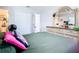 Main bedroom with a large bed, dresser, and walk-in closet at 240 People St, Maitland, FL 32751