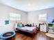bedroom with red bed, and storage solutions at 240 People St, Maitland, FL 32751
