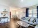 Open living and dining space with hardwood floors and ample natural light at 240 People St, Maitland, FL 32751