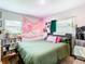 Cozy bedroom with a double bed and serene decor featuring a wave tapestry at 240 People St, Maitland, FL 32751