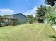 Large backyard with a storage shed and plenty of space for gardening at 240 People St, Maitland, FL 32751