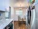 Kitchen with breakfast nook and view into living room at 240 People St, Maitland, FL 32751