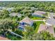 Aerial view of house with pool in a residential neighborhood at 708 Fox Edge Ct, Oviedo, FL 32765