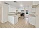 Bright kitchen featuring white cabinets and granite countertops at 854 Riverbend Blvd, Longwood, FL 32779