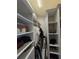 Spacious walk-in closet with ample shelving and hanging space at 531 Soft Shadow Ln, Debary, FL 32713