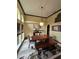Formal dining room featuring a wood table, bench, and chandelier at 531 Soft Shadow Ln, Debary, FL 32713