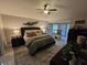 Spacious Primary bedroom with a king-size bed and plenty of natural light at 531 Soft Shadow Ln, Debary, FL 32713