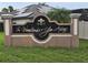 Community entrance sign for The Woodlands at Glen Abbey at 531 Soft Shadow Ln, Debary, FL 32713