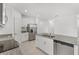Modern kitchen with stainless steel appliances and granite counters at 2482 Leeds St, Haines City, FL 33844
