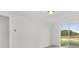 Bedroom with sliding glass doors and backyard access at 2482 Leeds St, Haines City, FL 33844