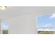 Bedroom with two windows and light-colored walls at 2482 Leeds St, Haines City, FL 33844