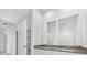 Double vanity bathroom with granite countertops at 2482 Leeds St, Haines City, FL 33844